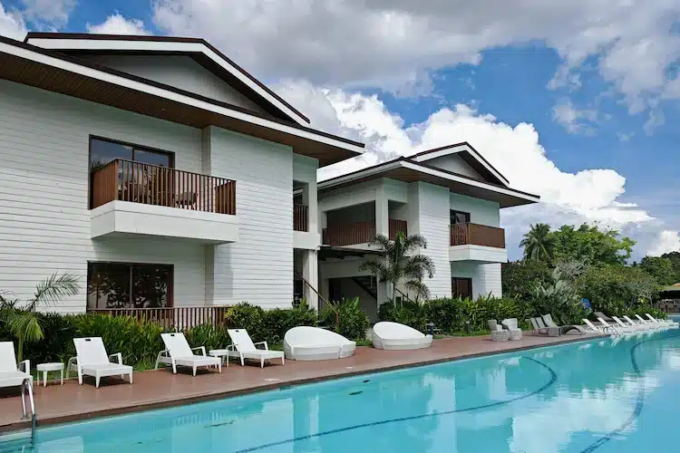 Sliding doors & Wood-finish aluminum railings in Nouveau Resort